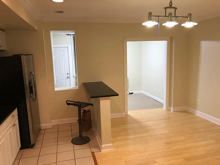Kitchen looking into the den