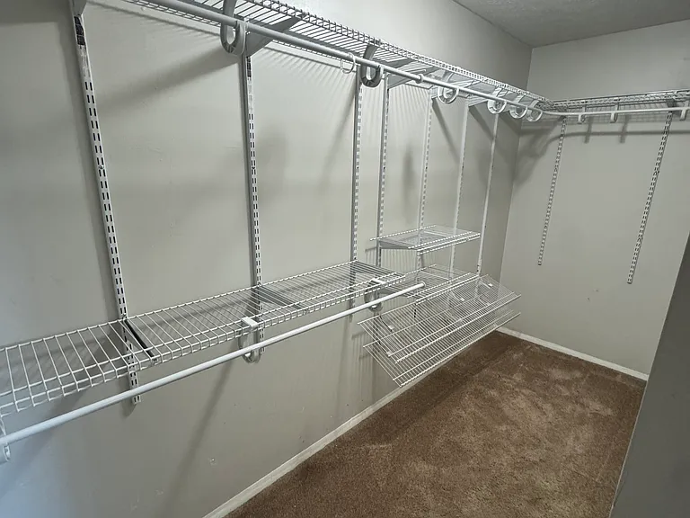 Walk in closet, with new carpet!