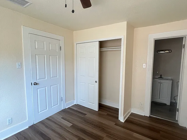 Bedroom 1 with large closet and attached bathroom