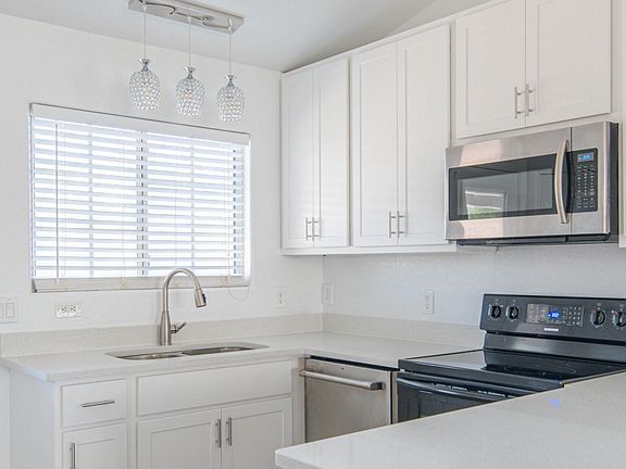 Remodeled kitchen in April 2021 with brand new cabinets and sparkling white quartz countertop!!