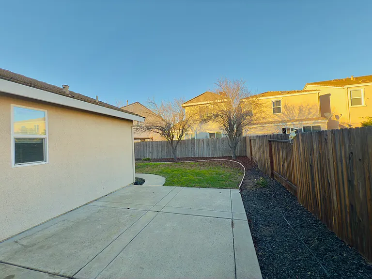 Spacious backyard perfect for kids, entertainment, and relaxation! A must-have feature, especially in the age of remote work_your outdoor haven awaits!