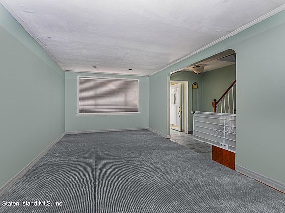5th image of 8927 15th Ave