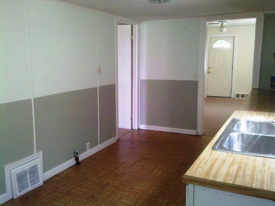 Kitchen- Back door 9'9" X 16'9" - 2'1" * 11'10" (counter top/cabinets/sink)