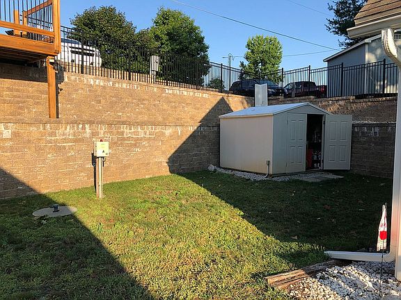 Upper shed & retaining wall 