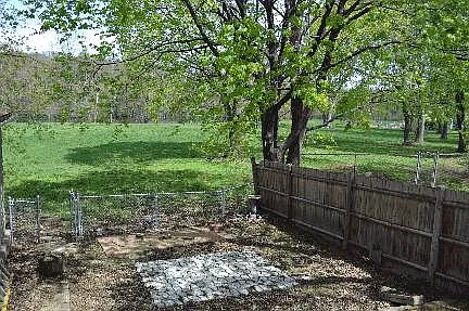 Back yard leading to park land and river