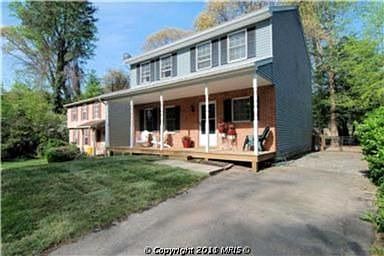 Plenty of parking in the asphalt driveway