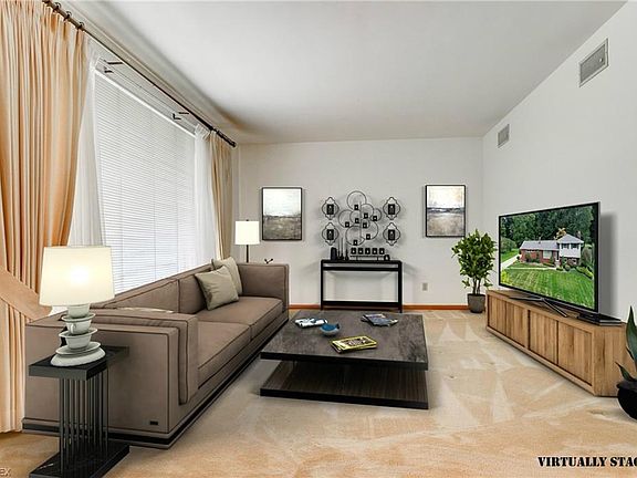 The Living Rm has been Virtually Staged so you can see the Great Design options for this room. Per Sellers, Hardwood Floors are 