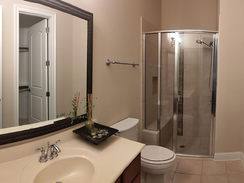 Suite 1 (downstairs): attached (ensuite) private bath with shower