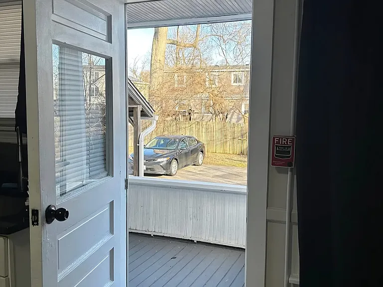 Rear Parking Lot to Private Porch and Rear Entrance