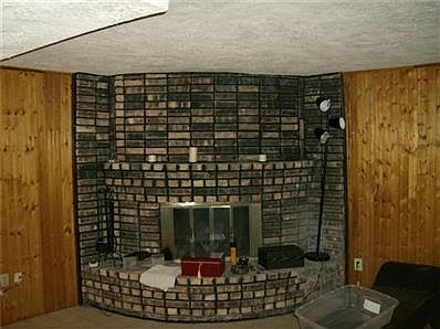 WOOD BURNING FIREPLACE IN FAMILY ROOM, IN BASEMENT
