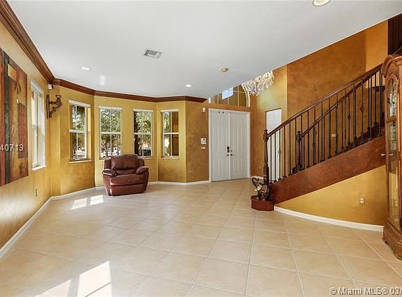 light & bright living room flows to dining room