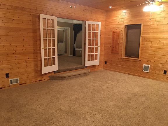 Family room. Doors lead to dining room and front entry.