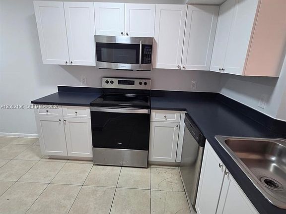 2nd image of 8871 Wiles Rd APT 208