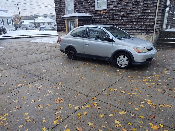 Driveway, Behind house (located on Marlow Street). Side door, (main entrance is visible to the right side of the photograph)