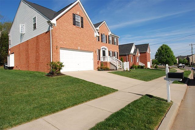 Located at end of street with common area beside home