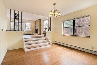 A beautiful sunken dining room, the perfect place to enterta