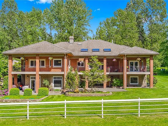 Featuring a 6770* sq ft east facing home (west facing backyard) with 4 bedrooms (3 en-suite bedrooms on the main floor), 4.5 baths, huge recreation space with a second full kitchen, wine room, exercise room, sauna and loads of storage. 