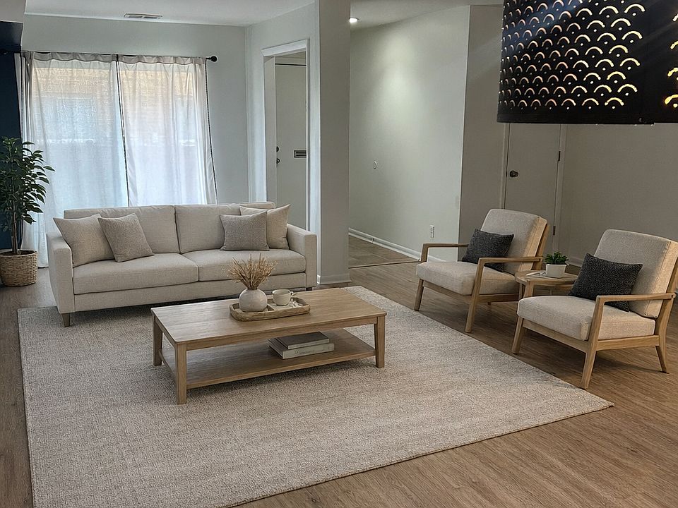 Bright and spacious living room featuring modern flooring, neutral walls, and abundant natural light_ideal for relaxing or entertaining.

"AI Staging Prompt"