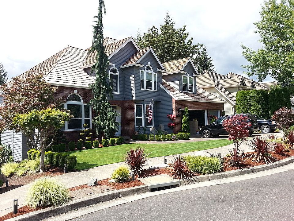 Front of the home and yard