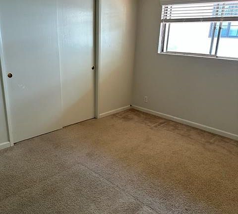Bedroom with double door closet space