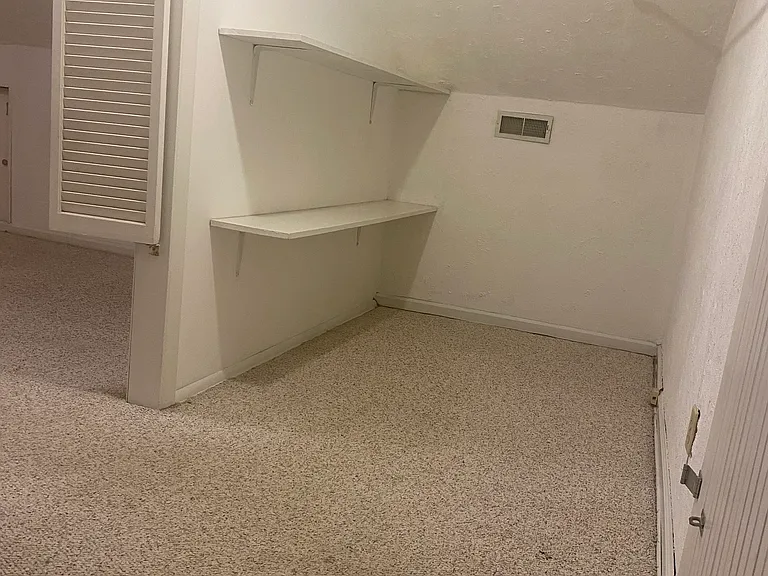 Half of walk-in closet measuring 
14.5'x 5'