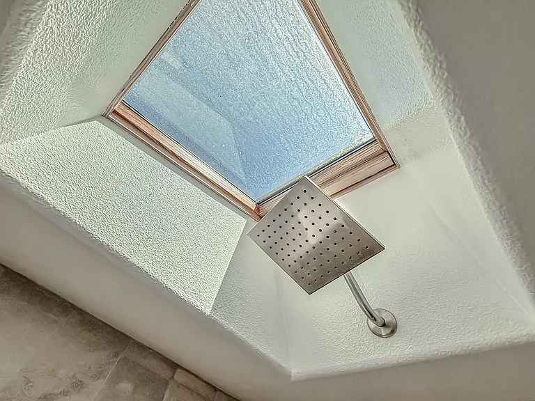 Rain shower with skylight