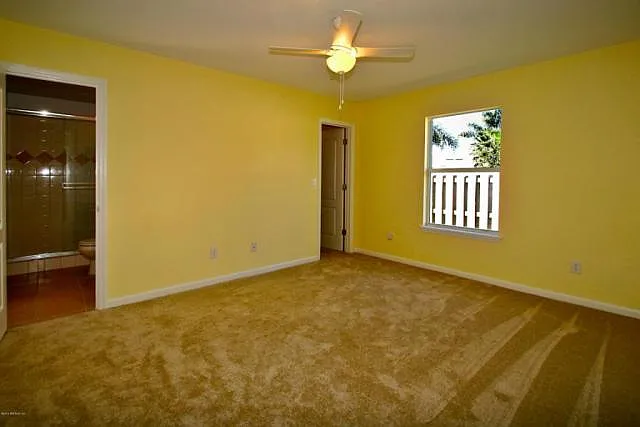 2nd of 3 bedrooms. Large walk-in closet can fit a dresser. 3rd bedroom is similar