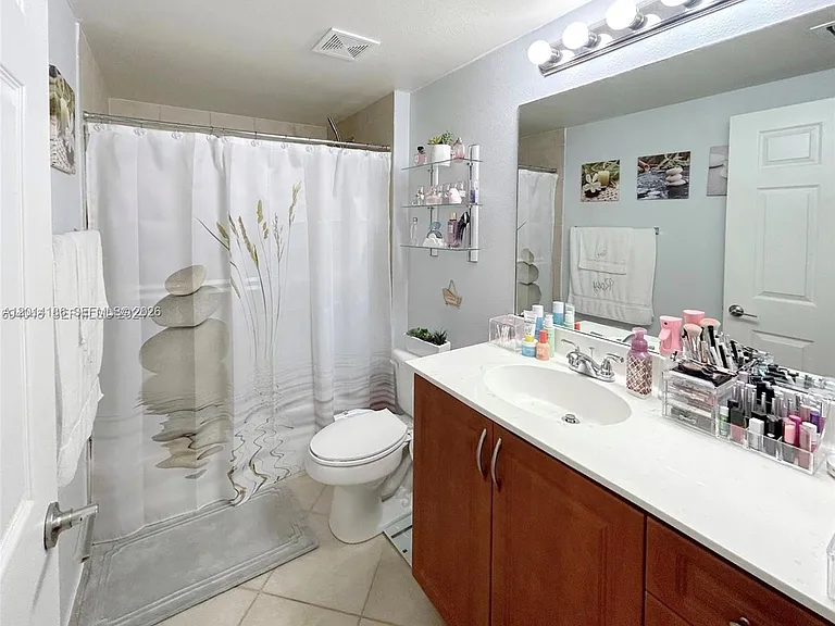 6533 Emerald Dunes Dr #208 — Photo 16
