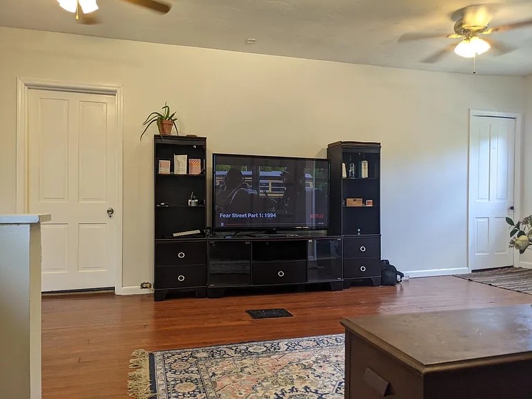 Third floor living space. Entertainment center can come with the unit if needed.