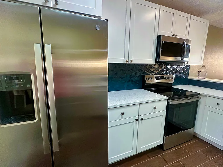 New kitchen. New appliances, new upgraded cabinets and new quartz countertops