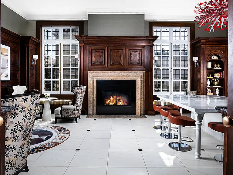 Modera Sedici's lounge spaces feature preserved historical elements and cabinetry seen in original architectural accent photos
