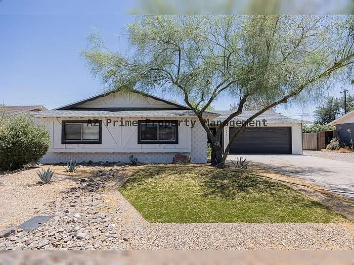 8447 E Lewis Ave — Photo 2