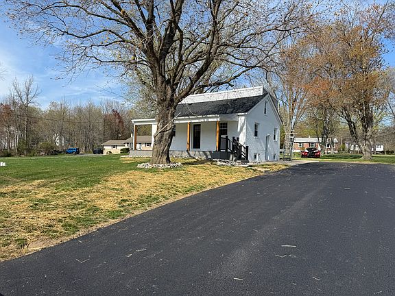 front yard at driveway entrance