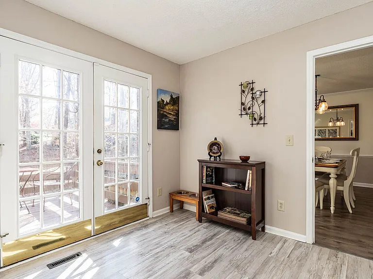 There is space here if you would like a breakfast table and chairs. We like it open ourselves but understand the convenience of a quick less formal in the kitchen meal.