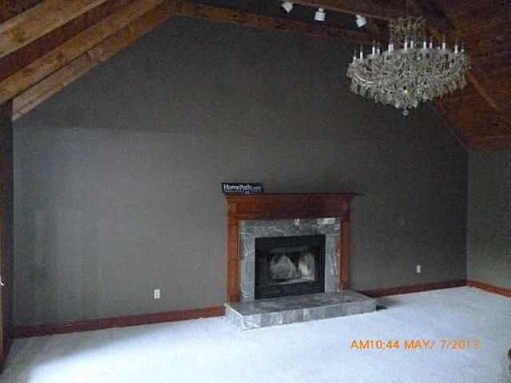 Living Room w/ Vltd ceiling