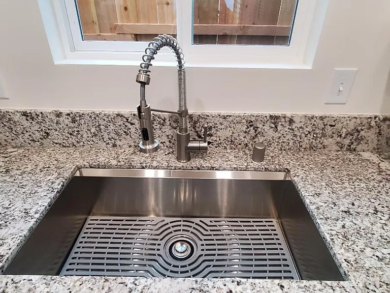 Large sink and faucet