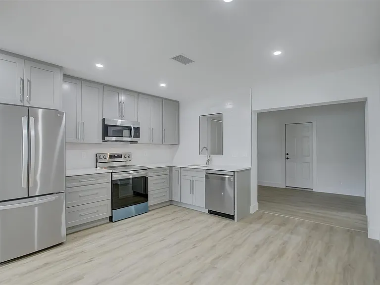 2155 NE 56th Ct — Photo 2