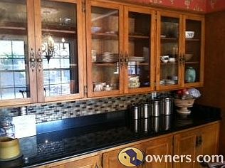 Glass front cabinets in kitchen