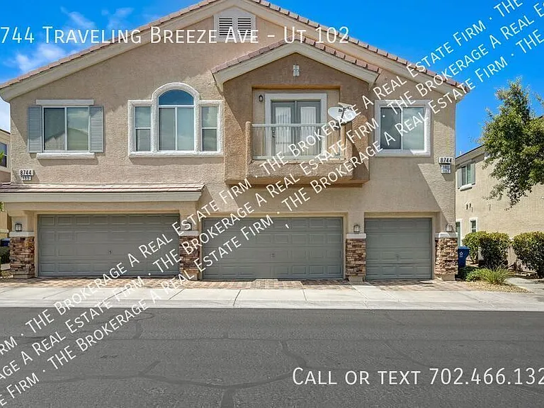 8744 Traveling Breeze Ave #102 — Photo 1