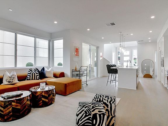Bright sunny first floor with high ceilings and hardwood floors

Photos are of model home. Bungalow will be unfurnished