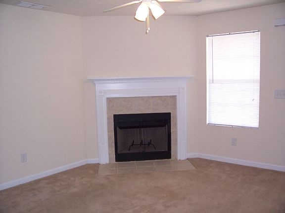 Family Room Made Cozy with Fireplace!