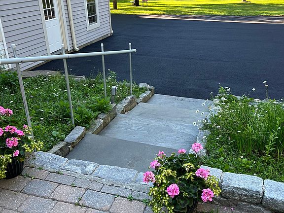 Newly paved driveway, Resident entrance off driveway.