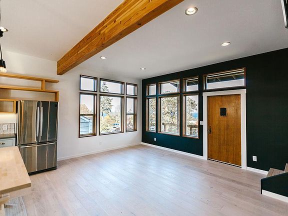 Livingroom with stairs going up to top level