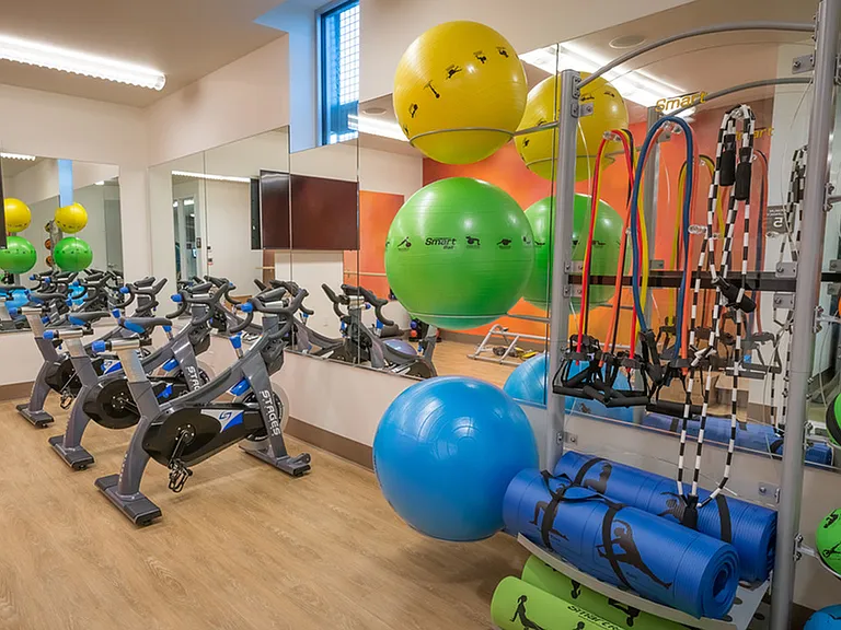 24-hour fitness center with Yoga/Pilates studio