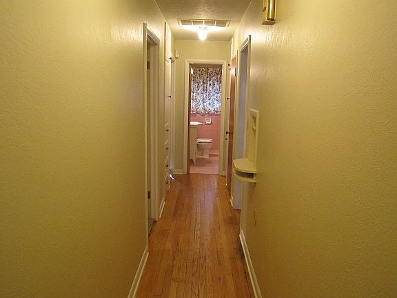 Hall with wood floors