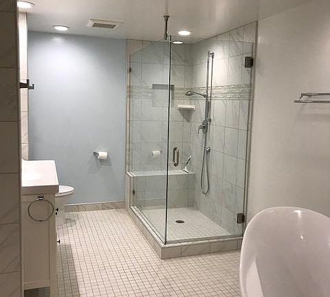 Large Bathroom with "slipper" style soaking tub and large shower.
