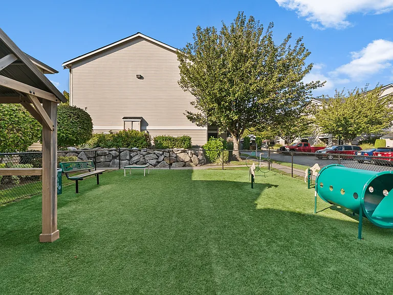 A community Dog Park_ Our fenced dog park has space to play, train, and relax.