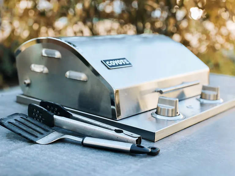 Outdoor grilling areas with gas grills