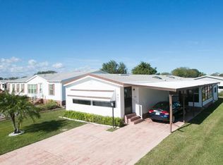457 Dolphin Cir, Barefoot Bay, FL 32976