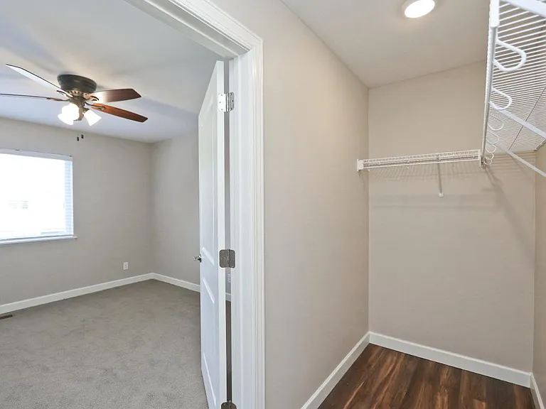 Large walk in closet in bedroom